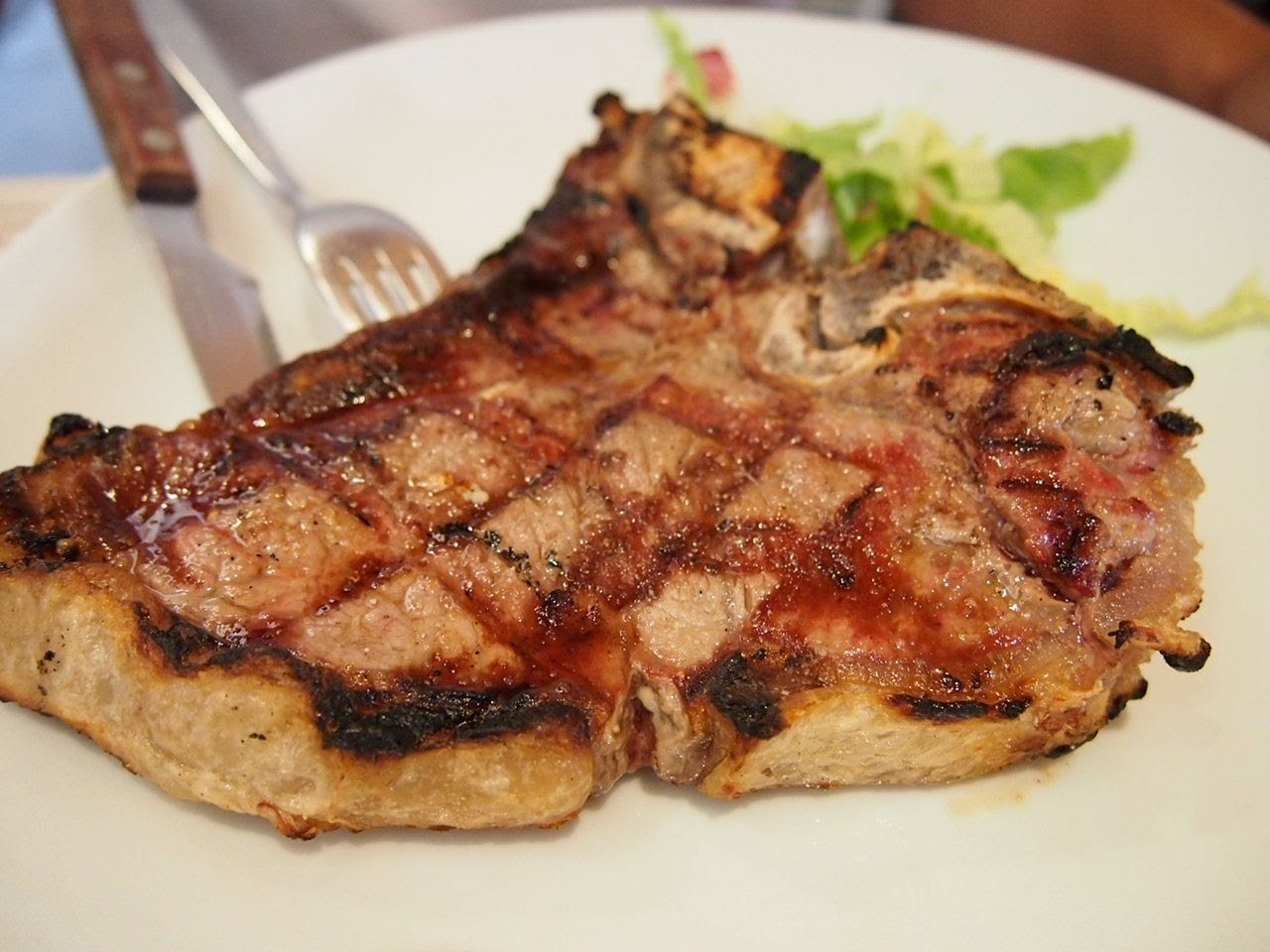 Delicious Bistecca alla Fiorentina and refreshing Limoncello from Italy